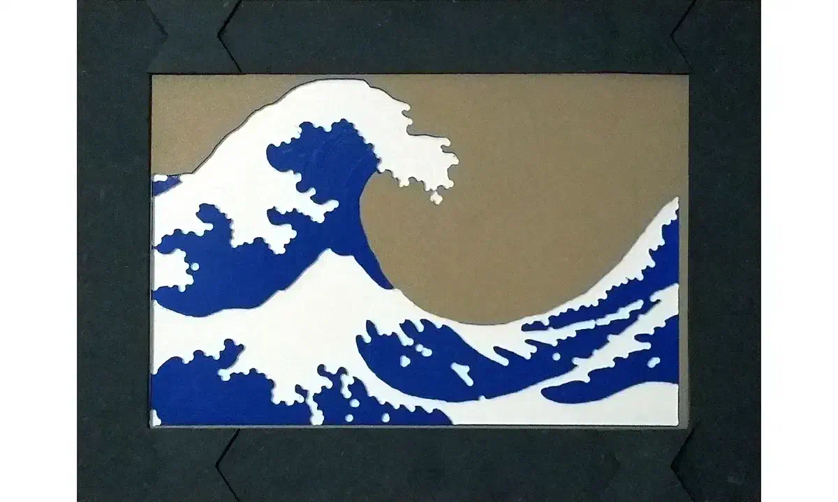 A dark MDF frame with shaped corner joints around blue and white wave artwork